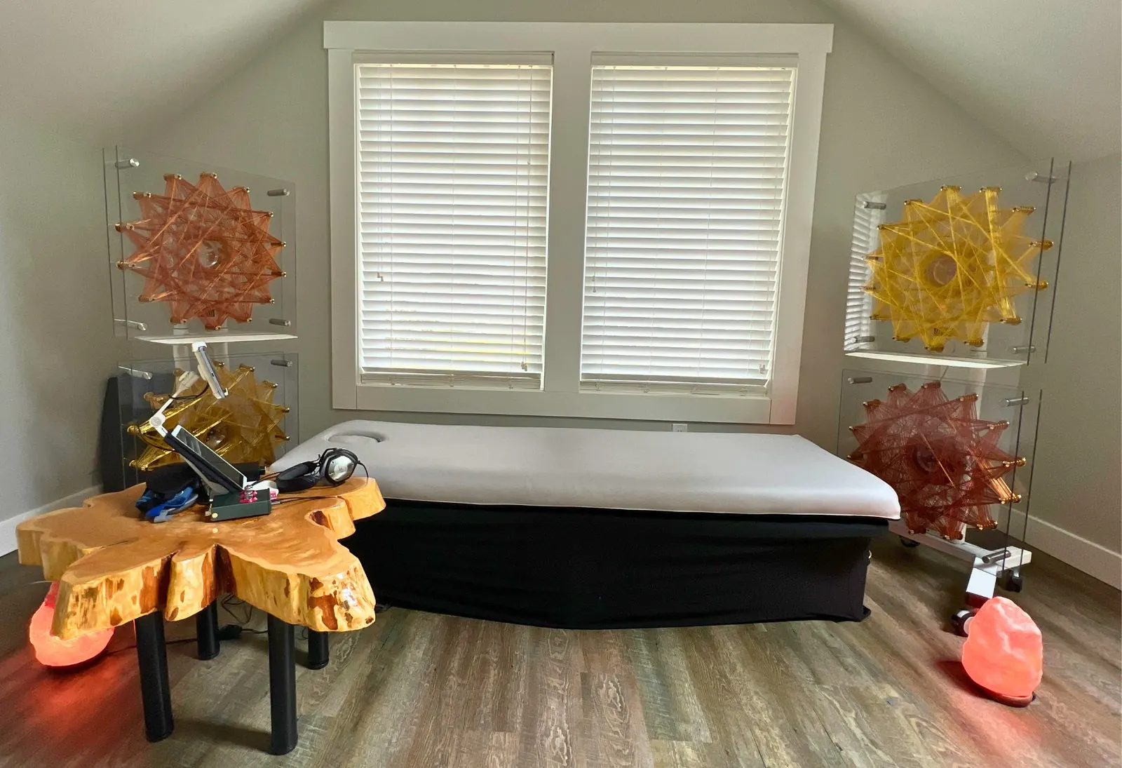 The real Quantum Oasis Q-Bed treatment room in Gibsons with the vibroacoustic bed and Qi Coil Aura frequency coils